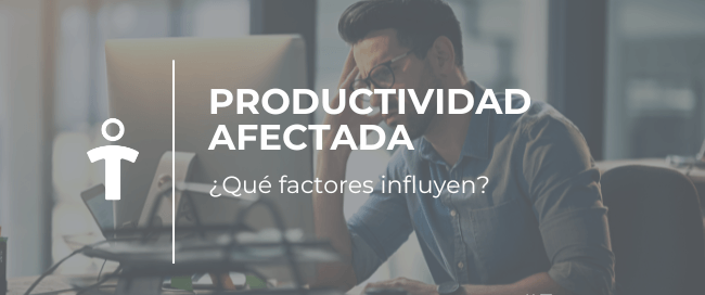 Hombre en una oficina trabajando frente a una PC con el texto: Productividad afectada — ¿Qué factores influyen? #Empresas