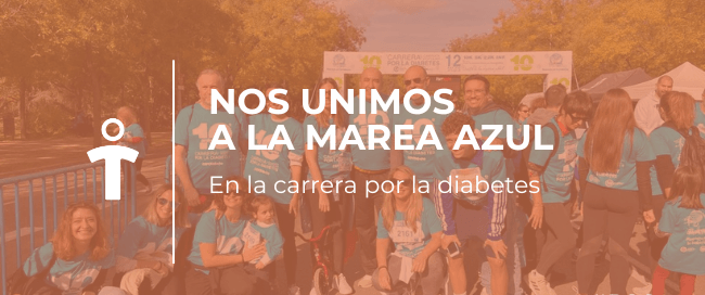 Group of runners and supporters in teal shirts posing at the start/finish area of a diabetes awareness race, with a banner in the background.